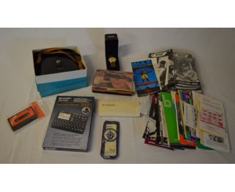 Sharp electronic organizer, binoculars, film programmes, Blue Peter patch badge, Parker pen etc