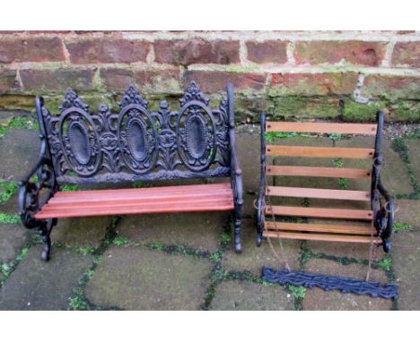 Cast iron and wood doll's bench and swing