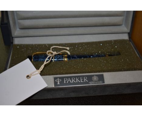 A Parker Duofold Centennial fountain pen with 18ct gold nib, blue marble finish. With case and box.