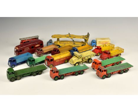 A large collection of Dinky Toys commercial vehicles / lorries, to include a Fire Engine 555, red body with silver trim and l