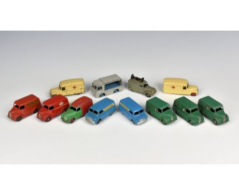 A collection of Dinky Toys playworn die-cast vans, comprising of 2 x Bedford 'Ovaltine' 481 vans; 3 x Trojan 'Chivers Jellies