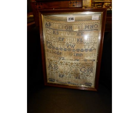 A small 19th century alphabet sampler dated 1854 by Susannah Howard,