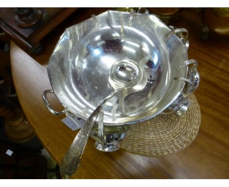 A silver plate punch bowl,with six cups and ladle.
