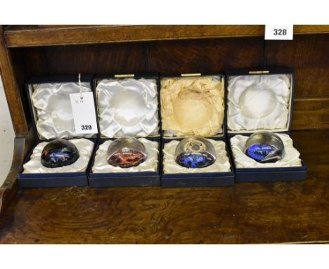 Four boxed Caithness limited edition paperweights all dated 1971 to include,Jupiter (315/500), Uranus (394/500), Earth (315/5