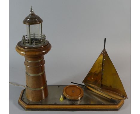 A Novelty Table Lamp in the Form of Sailing Boat and Light House, On Rectangular Plinth Base, 40cm Wide