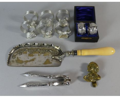 A Tray Containing Silver Plated Crumb Tray, Pair of Cased Silver Napkin Rings, Brass Door Knocker, Place Name Holders etc 