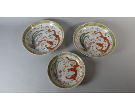 Three Chinese Plates Decorated with Red Dragons, Marks to Base in the Manner Kangxi and Guangxu 