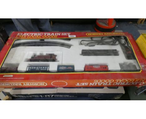 A Hornby Railways LMS Local Goods OO Gauge Train Set and a Part Lima Train Set