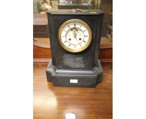 A Delettrez, Paris, a late 19th century black slate regulator mantel clock, having an eight day barrel striking movement face