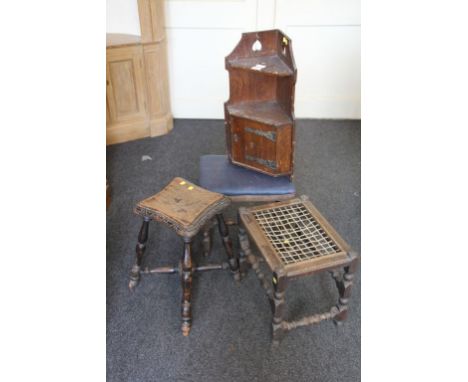 A Victorian oak corner cupboard, with shelf above, the single door with decorative strap hinges, 35 cm (13 1/2 in) wide, toge