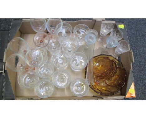 Two boxes of cut and moulded glassware, together with a 1920s amber tinted dessert service, Lladro-type figures and a pair of