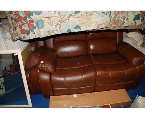 Two seater leather sofa and matching armchair, slightly worn on arms.