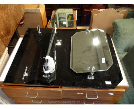 Black glass backed bathroom over basin unit  with tilt mirror, 25'' wide x 33'' high.