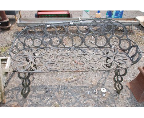 An intriguing Garden bench made from used horse shoes 4'10".