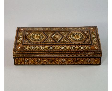 Two Damascus ivory inlaid folio covers, 19th century, 26 cm high; together with a mother of pearl inlaid box, (3).  CONDITION