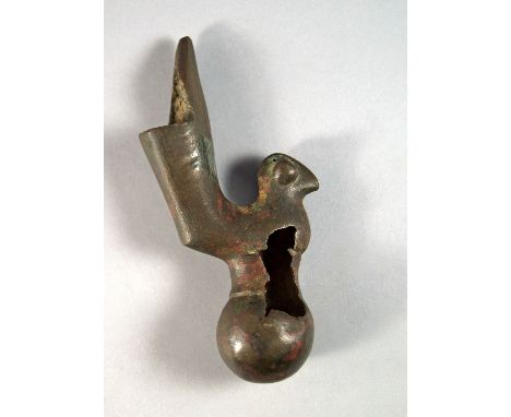 A Luristan bronze bird attachment, probably from a lamp or vessel, circa 700-900 B.C. modelled in the round and having stylis