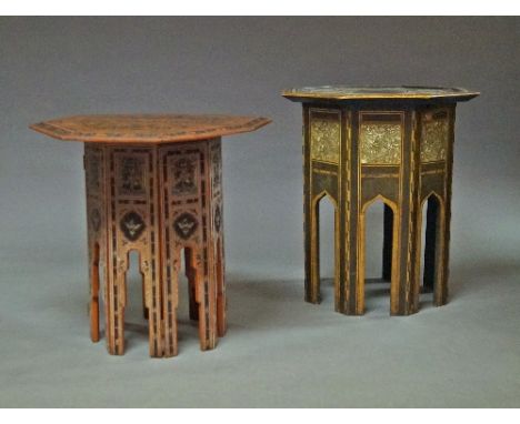 A Middle Eastern octagonal mother of pearl inlaid table, 20th century, with star decoration to top, on ogee arched legs, 66cm