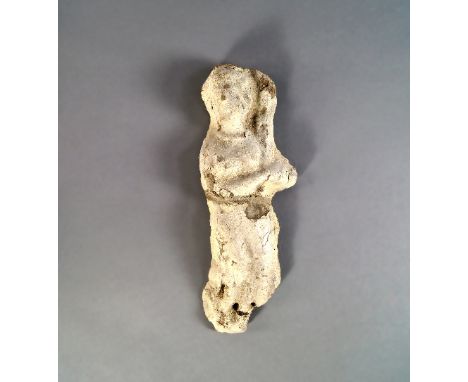 A Greco Gandharan stucco Goddess, modelled in deep relief, wearing cloak, 17cm high CONDITION REPORT: damaged as seen