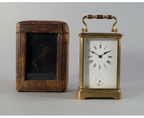 A brass carriage clock, 20th century, with plain rectangular case, the white enamel dial with Roman and Arabic numeral chapte