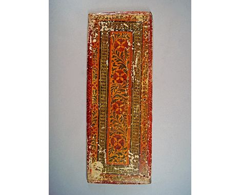 An Indian polychromed panel, 19th century, originally the cover for a manuscript, decorated with female figures standing arou