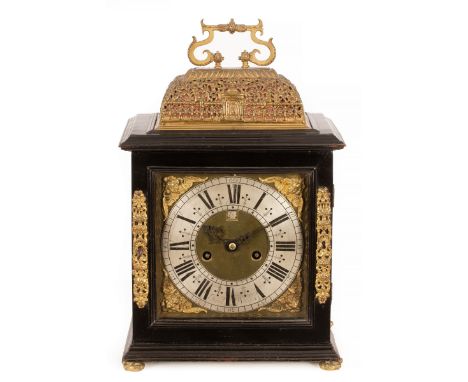 A William & Mary ebonised eight-day, bell striking, bracket clock, John Wrench, Chester, the caddy top with gilt handle and p