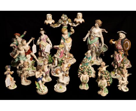 A group of nineteen late 19th/early 20th Century Continental porcelain figures in the style of earlier models, to include a f