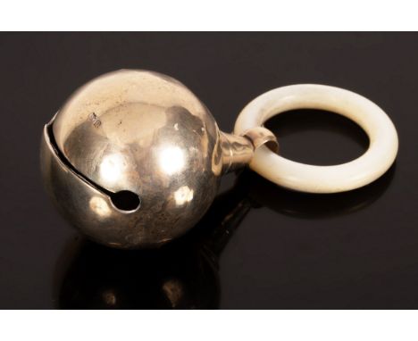 A silver rattle, George Unite, Birmingham 1919, with mother-of-pearl teething ring, approximately 52g gross CONDITION REPORT: