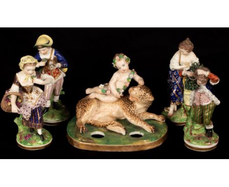 A set of four Continental porcelain figures emblematic of the Seasons, together with an inkstand cover modelled with a cherub
