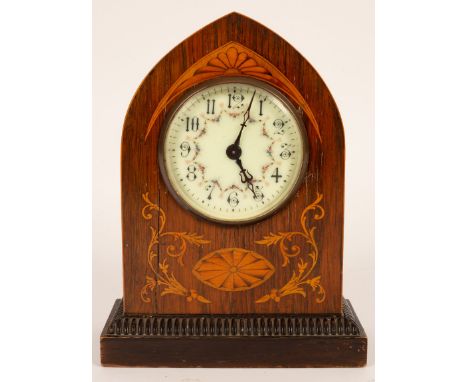 An Edwardian inlaid arch cased mantel clock, 23cm high CONDITION REPORT: Condition information is not usually provided in the