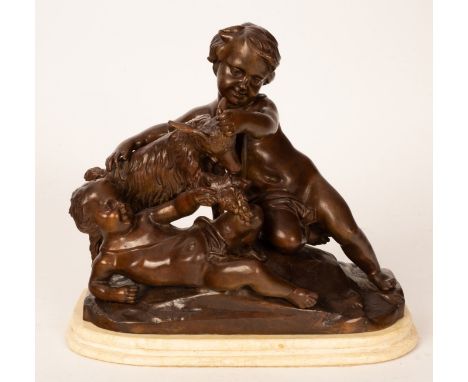 A figure of putti with a goat, bronze, 27cm high CONDITION REPORT: Condition information is not usually provided in the descr