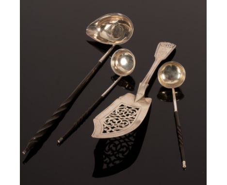 A Victorian silver fish slice, John Samuel Hunt, London 1857, a toddy ladle, set with a George III coin and two further toddy