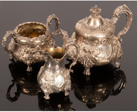 A Victorian silver three-piece tea set, Edward & John Barnard, London 1857, each piece with foliate and scroll decoration thr