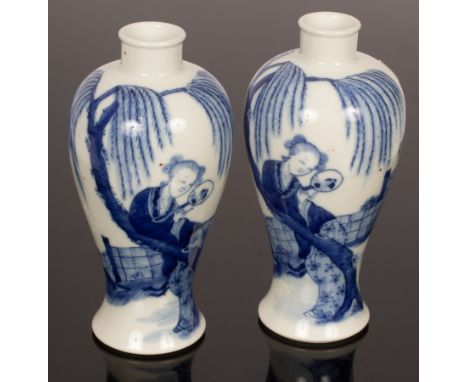 A pair of Chinese baluster blue and white vases, 20th Century, decorated a lady enjoying the scenery of a garden, base mark '