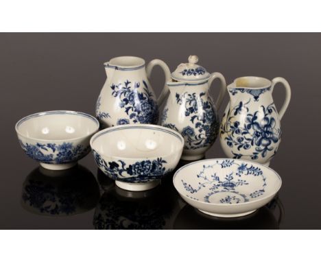 A quantity of Worcester blue and white tea wares, comprising two sparrow beak milk jugs and cover and two bowls printed with 