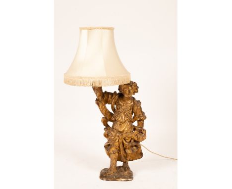 An early 18th Century figure of Plenty adapted as a table lamp, 70cm high (not including shade)/Provenance: The Estate of the