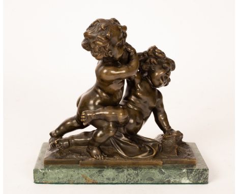 A figure depicting putti, bronze, 23cm high CONDITION REPORT: Condition information is not usually provided in the descriptio