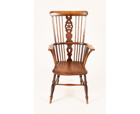 A Windsor wheelback chair with pierced splat and dished elm seat/Provenance: The Estate of the late Diana & Gospatric Home, L