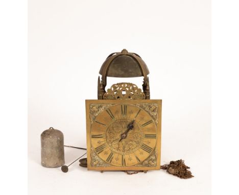 An 18th Century striking lantern clock, the 11 inch dial possibly associated and signed 'Tho Trigg', London, 34cm high CONDIT