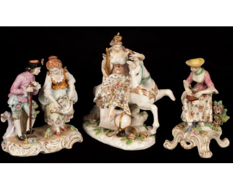 A 19th Century Continental porcelain figure of Catherine the Great on horseback, another of a couple gardening and a figure o