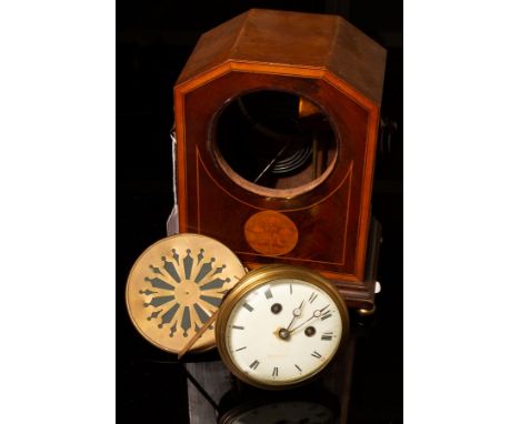 An Edwardian inlaid mantel clock with French twin-train movement, Arts & Crafts style tulip detail and on four brass bun feet
