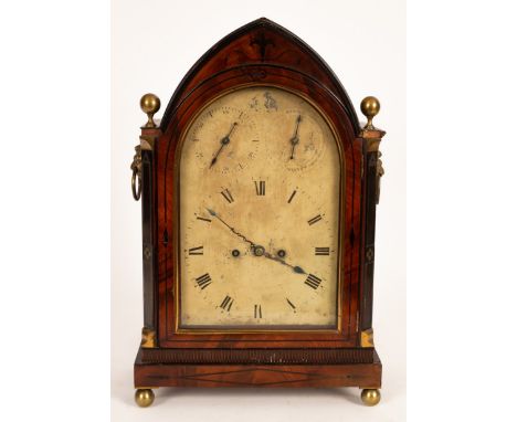 A Regency mahogany cased mantel clock, fitted a twin fusee movement in an arched case, 50cm high/Provenance: The Estate of th