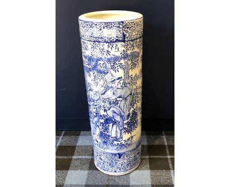 LATE 19TH/EARLY 20TH CENTURY CHINESE BLUE AND WHITE CERAMIC STICK STAND, painted with figures in a bamboo garden setting, 60c