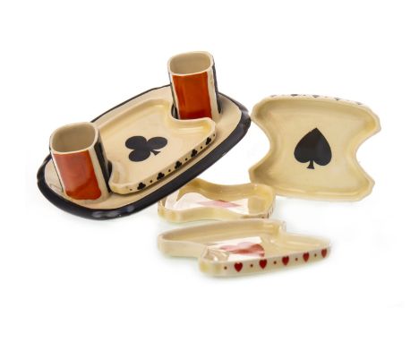 ROYAL DOULTON POTTERY ART DECO BRIDGE SET, of rounded oblong form printed in underglaze black and overpainted in orange with 