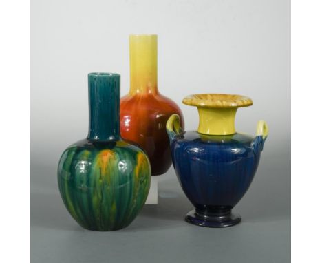 Attributed to Dr. Christopher Dresser, two similar Linthorpe Pottery vases, of bottle form, with drip glazes, impressed marks