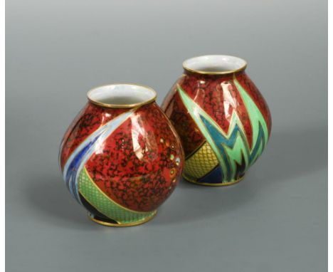 A rare pair of Carlton ware 'Jazz' pattern vases, pattern no. 3352, printed and painted in colours on a red ground, highlight