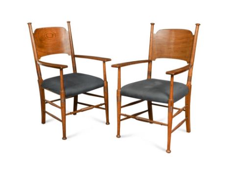 William Birch, a set of six oak dining chairs, comprising four singles and a pair of carvers with re-upholstered seats, below