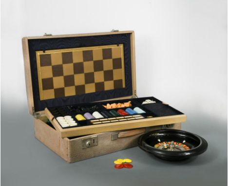 A mid-20th century Fortnum &amp; Mason games compendium, the large case opening to reveal a fully fitted interior, a gilt too