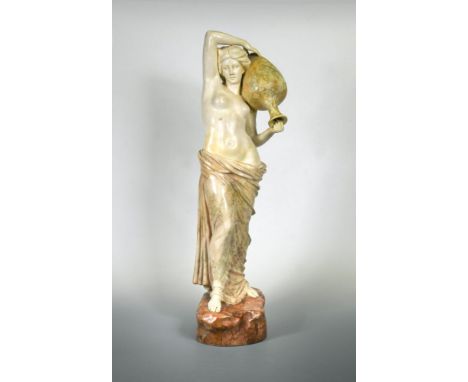 B. Haniroff for Goldscheider, an Art Nouveau cold painted earthernware classical figure, modelled as a half nude female water