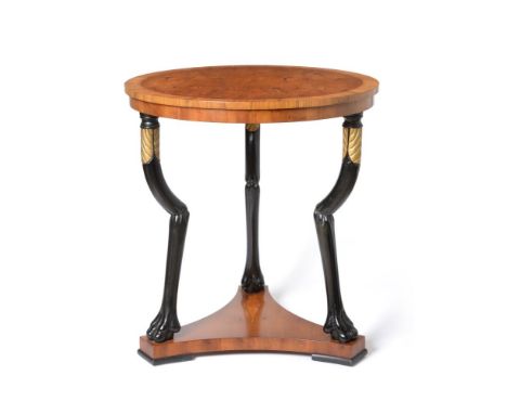A pair of Biedermeier style yewwood and kingwood veneered and crossbanded tripod centre tables, the circular tops above eboni