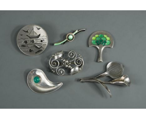 A good collection of mostly Scandinavian jewellery, including a small Danish metalwares brooch designed by Arno Maalinovski f